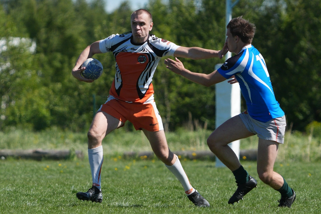 RFC Märjamaa player carrying a rugby ball